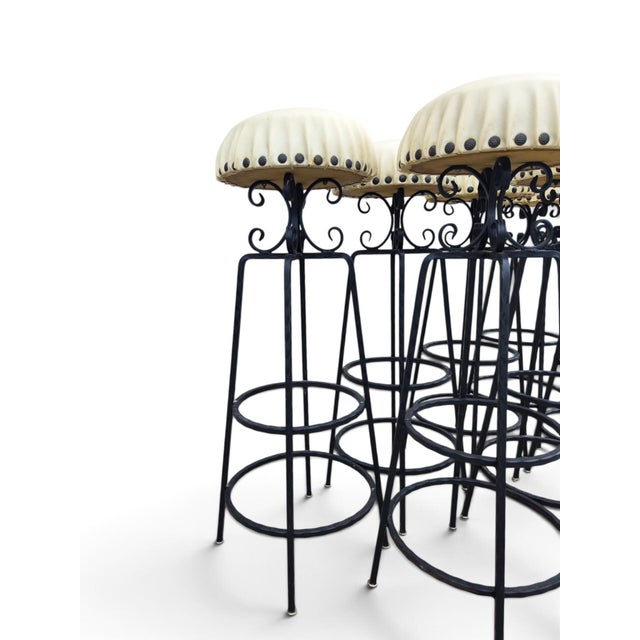 Specifications This set of eight French barstools from the 1970s brings a distinct vintage character to any space. The...