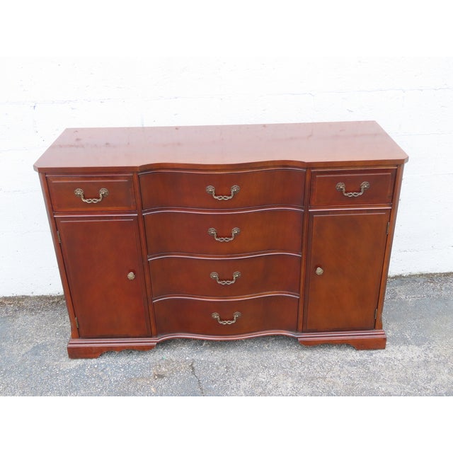 This magnificent Sideboard is made of wood, solid wood, mahogany, and veneer. This wonderful piece is an excellent example...