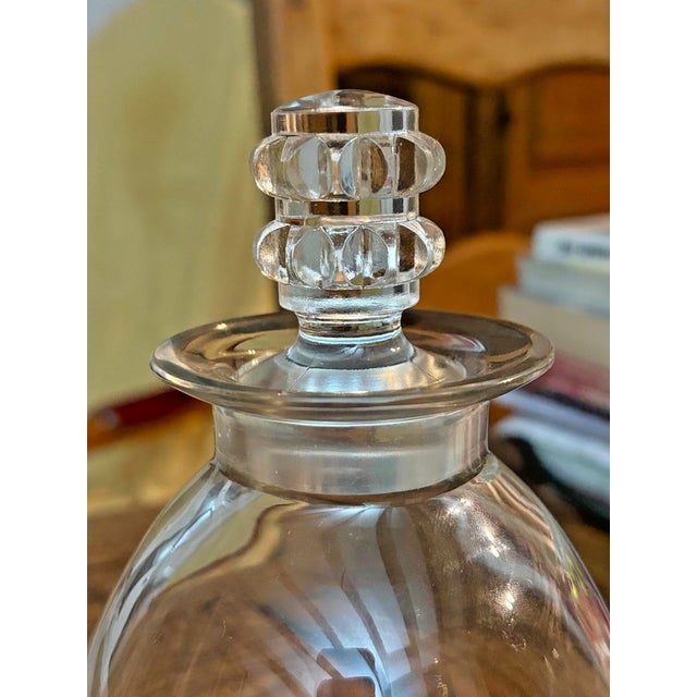 René lalique (1860-1945). ovoid wine decanter with a rolled neck, "vougeot" model. an early, mass-produced piece made of...