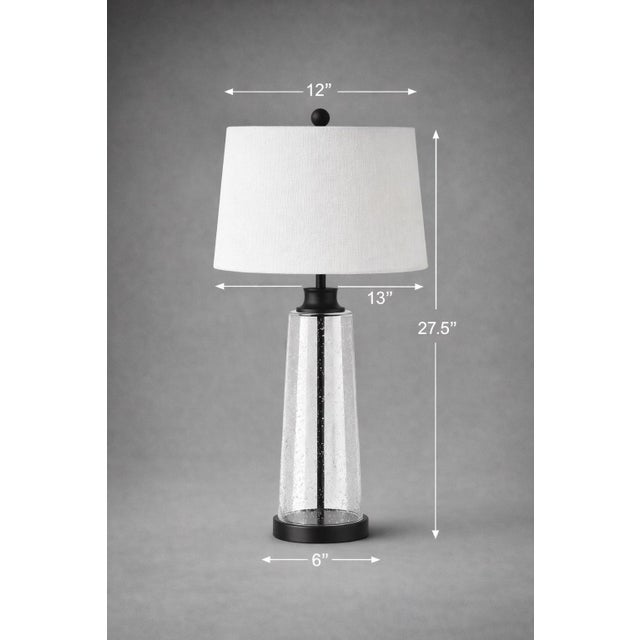 Mobile-Ready Blurb An elegant pair of late 20th century seeded glass table lamps distinguished by their beautifully...