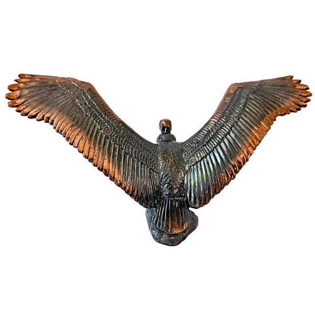 This authentic, heavy cast bronze/brass miniature sculpture depicts the extinct Pleistocene bird of prey, Teratornis...