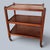 a versatile mid-century wooden drinks trolley with three useful tiers and four castors. Ideal as a cocktail bar cart, tea...