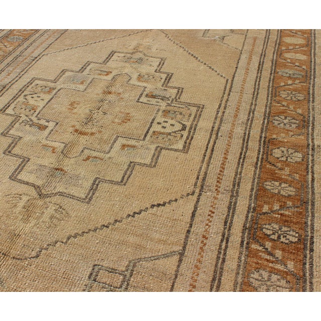 Medallion design Turkish vintage rug in neutral tones of tan, taupe, light brown, camel, and light green, Keivan Woven...