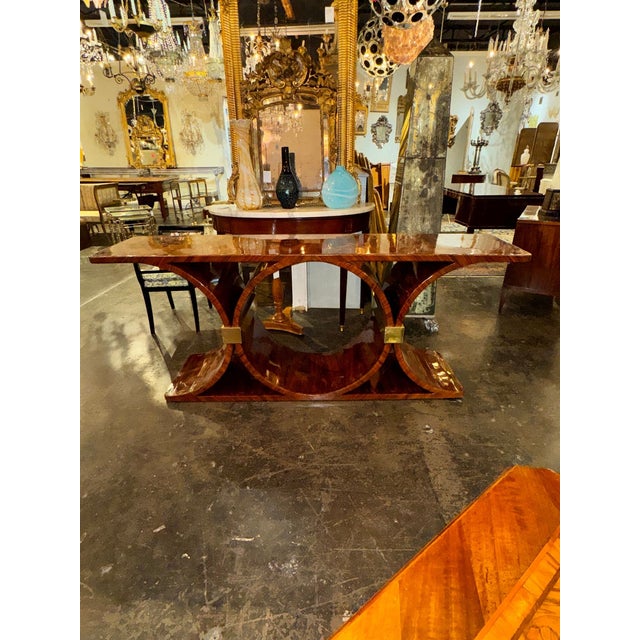 The MCM Art Deco Style Black Walnut Console is a beautifully crafted piece of furniture perfect for any adding a touch of...