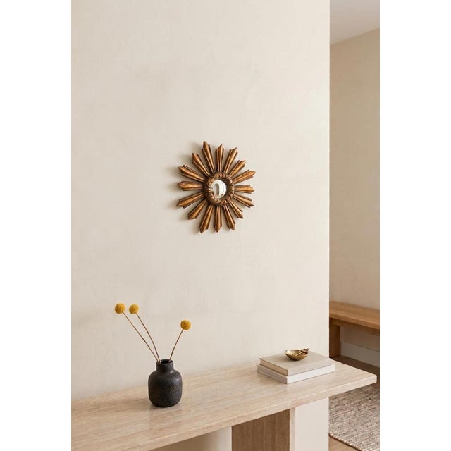 Convex mirror, witch's eye. Original gold finish. The glass measures 9 cm in diameter.