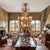 We are pleased to present this elegant and refined chandelier dating back to the early 20th century, with 19 light bulbs....