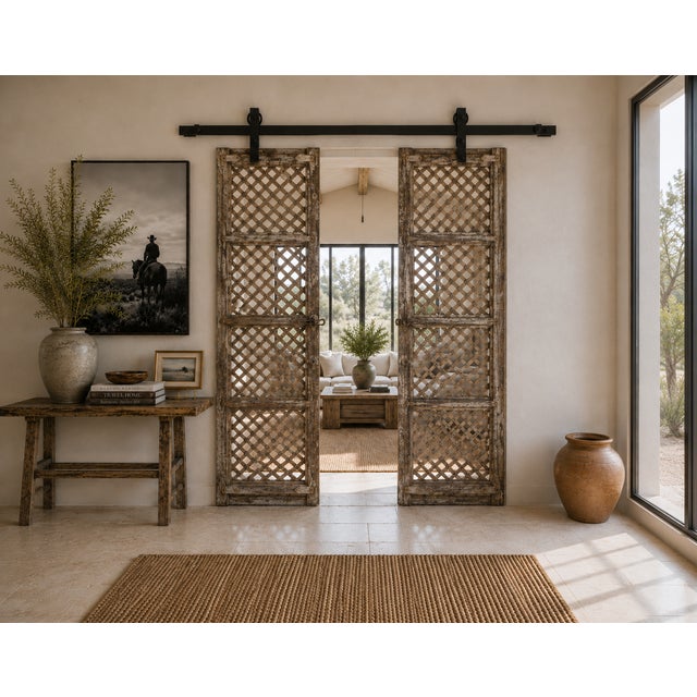 Antique Indian Carved and Sun Bleached Teakwood "Jali" Trellis Door, late 19th century from Rajasthan, features a trellis...