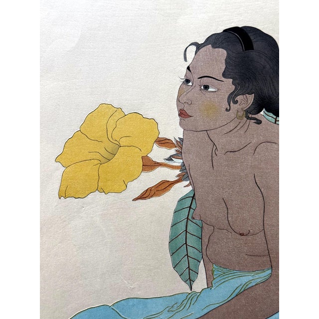 A Japanese Woodblock print by Paul Jacoulet (French, 1896-1960) entitled Jeune Fille de Saipan et Fleur d'Hibiscus...