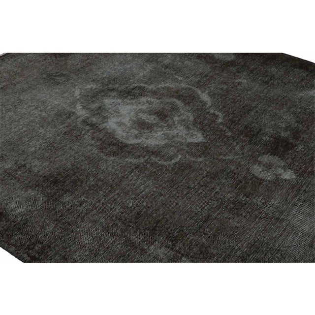 From our new collection of overdyed rugs, a vintage 6x8 Persian rug originating circa 1970-1980 or possibly earlier. On...