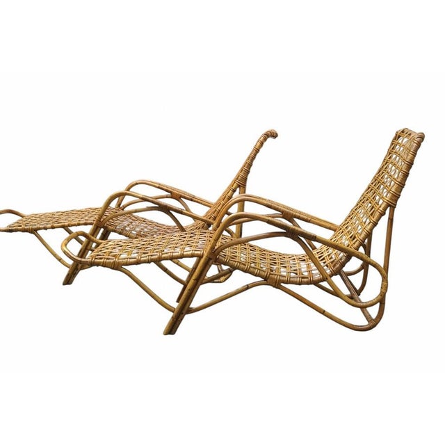 An elegant pair of Italian-made chaise longues, dating from the mid-20th century and attributed to Tito Agnoli for...