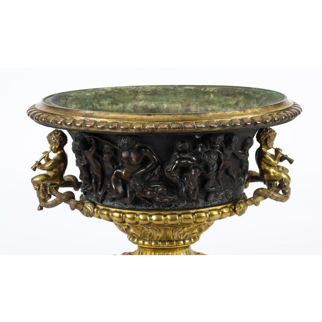 This is a beautiful large antique French Grand Tour dark patinated bronze and ormolu jardiniere, Circa 1830 in date. This...