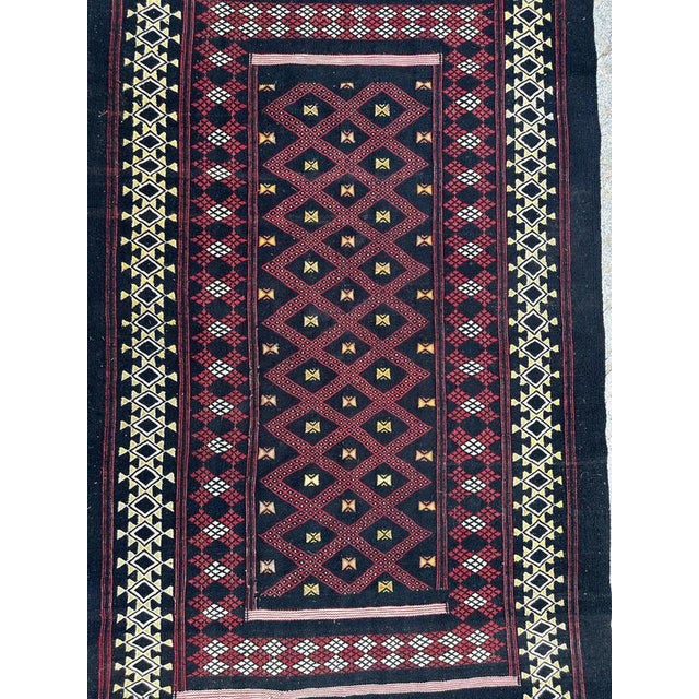 Mid-20th-Century Moroccan Wool Kilim – Woven on Cotton Foundation A striking mid-20th-century Moroccan kilim,...