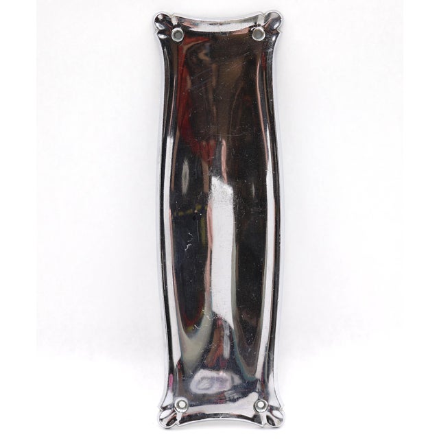 Vintage push plate made of brass with a chrome finish. Stamped Manhattan on the back. The original mounting screws are not...