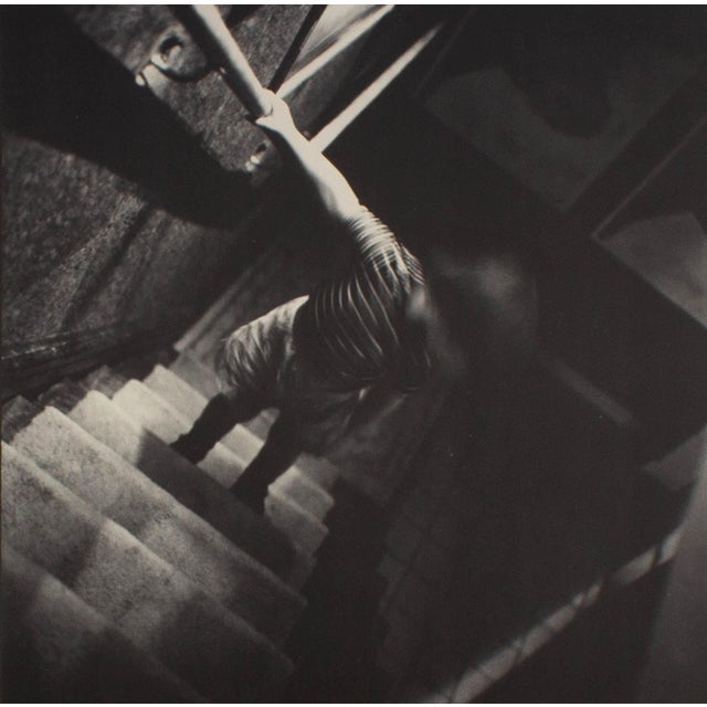 A 1991 poster for the exhibition "Images from 25 Years, 1966-1991" of works by the American photographer Bruce Cratsley...