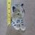 Charming vintage ceramic cat figurine from the *Formalities* collection by Baum Bros, featuring an elegant blue and white...