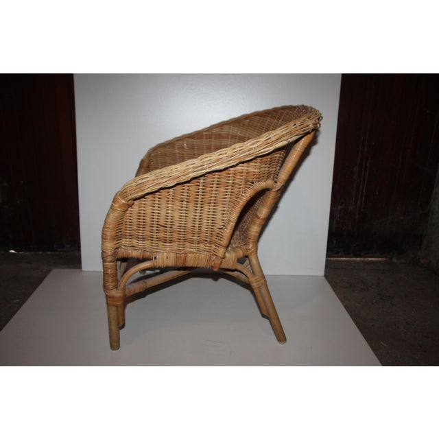 Vintage wicker armchair. Dimensions: Height 20.8" / 53.5 cm Seat height 10.2" / 26 cm Seat depth 12.5" / 32 cm Seat width...