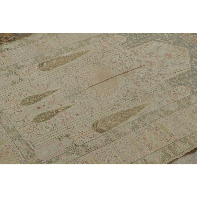 Hand-knotted in natural silk circa 1920-1929, this exquisite 4x5 antique Turkish rug is a true masterpiece. It features a...