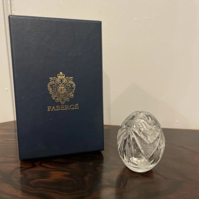 Hand cut crystal egg by Faberge in presentation box. Etched and cut in the belle epoque Imperial Russian style that...