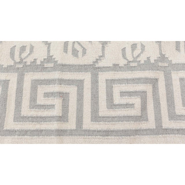 Vintage Indian Dhurrie rug Size: 13'10" × 14'6" (421 × 441 cm). Striking in its balance of elegance and graphic clarity,...