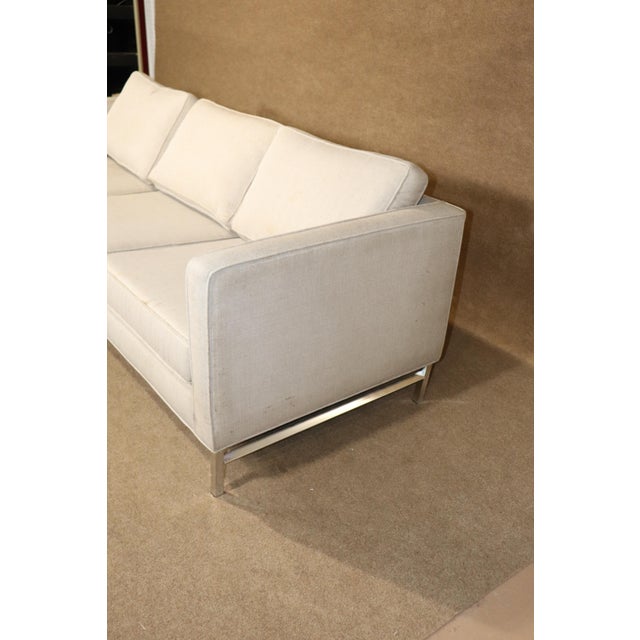 Long sofa with simple Mid-Century Modern Knoll inspired design. Three seats on chrome frame.