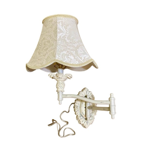 20” tall swings out to 25” good condition Add timeless elegance and adjustable light to your space with this charming...