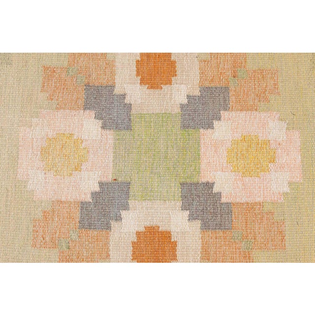 Vintage Swedish Flat Woven Rug by Ingegerd Silow Size: 4'5" × 6'3" (134 × 190 cm) This charming Swedish flat weave rug,...