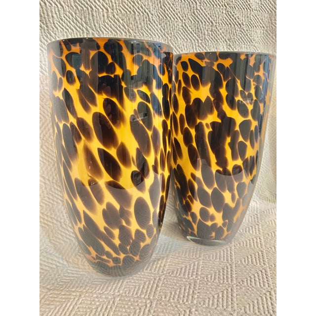 These vases are large and the tortoise shell/leopard print is always welcome in any decor. Each vase stands 11.75" high...