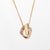 Stylish and finely detailed pre-owned Cartier Cushion shaped pendant & necklace crafted in 18k yellow gold (current...
