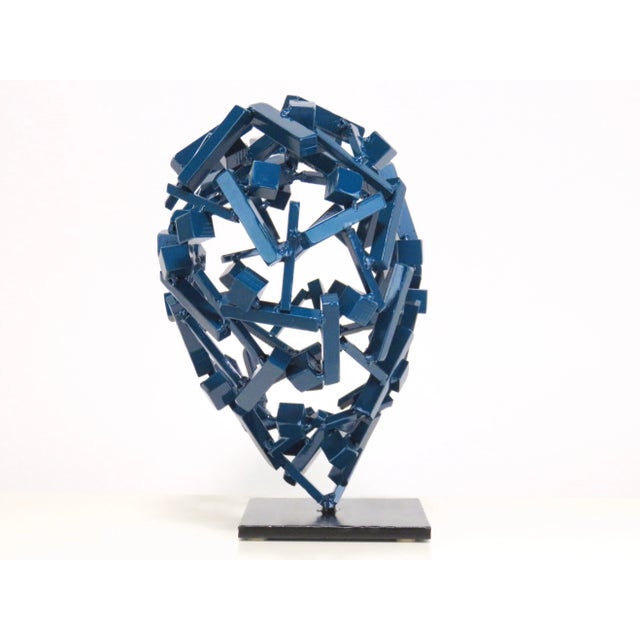 ‘Tahoe Water' is a one of a kind hand cut and welded steel, powdered coated lacquer gloss. The Square Hearts Series is an...
