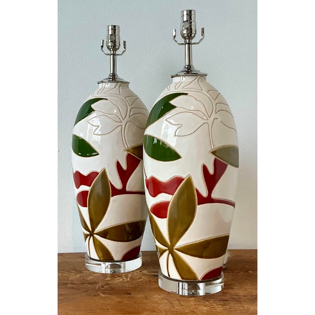 This striking pair of vintage table lamps epitomizes the vibrant "Palm Beach" aesthetic of the Postmodern era. The ovoid...
