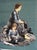 An Antique (circa 1870s or so) French Beaded Tapestry. The Mother and Daughter are worked in tiny glass beads, their skin...