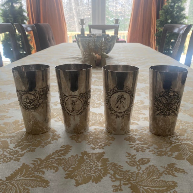 Value Insights This German silver trophy cup features an embossed motif of a target and crossed weapons, reflecting a...