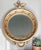 A striking vintage Federal-style eagle mirror featuring a beautifully detailed eagle crest and thirteen decorative balls...