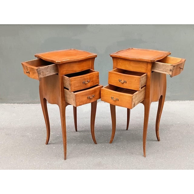 Set of two french Louis XV style nightstands. Can also be used as sofa ends, side tables…. Parisian work from the middle...