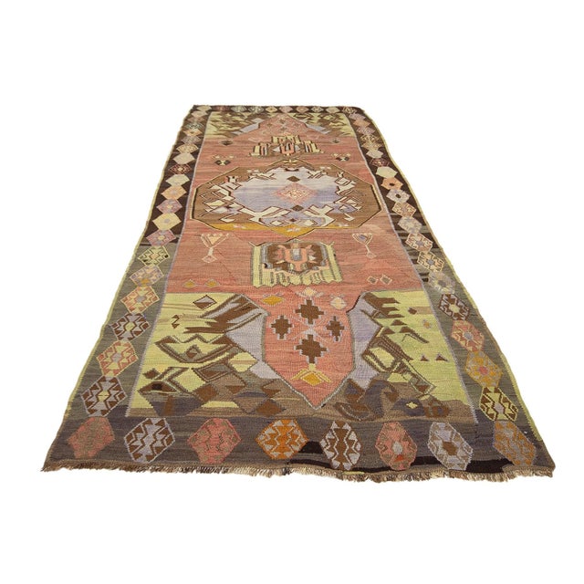 Handwoven vintage kilim rug from Kars region of Turkey. Approximately 50-60 years old. In very good condition.