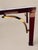 Superb coffee table with a high-gloss wood frame and solid brass arches and spheres. The tabletop is made of brand-new 8...