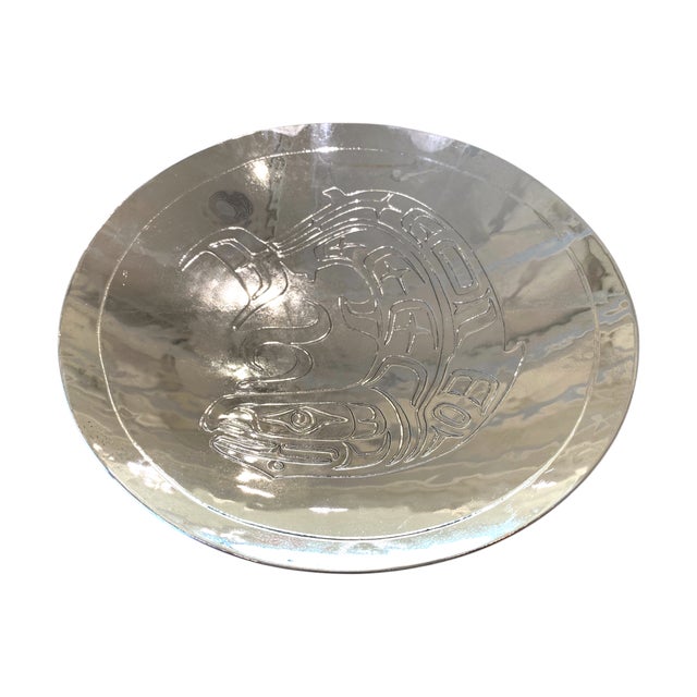 A beautiful silvered copper pedestal bowl by contemporary Canadian First Nations artist Harold Alfred. The interior is...