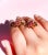 About These Earrings: These Vintage Retro Diamond and Ruby Earrings are crafted in 14K rose gold and platinum, showcasing...