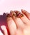 About These Earrings: These Vintage Retro Diamond and Ruby Earrings are crafted in 14K rose gold and platinum, showcasing...