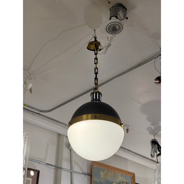 Design Plus Gallery presents the Hicks Large Globe Pendant by Thomas O’Brien for Visual Comfort. This pendant has a white...