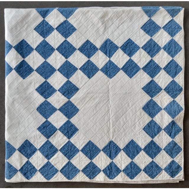 This wonderful indigo and white Double Irish Chain antique cotton quilt in a classic color palette is a summer weigh, very...