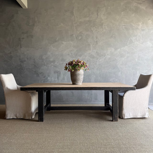 The De Luz reclaimed elm wood dining table embodies the essence of wabi-sabi, celebrating imperfections and the beauty of...