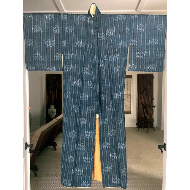 On offer is a Japanese summer kimono woven from indigo blue linen with ivory color fine stripes patterns with apparently...
