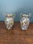 A pair of matched Murano millefiori double handled vases from the school of Fratelli Toso. They are approximately 5 inches...