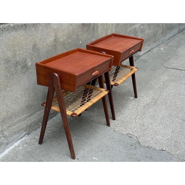 A pair of beautiful Danish teak night stands from the mid 1960´s. The pair is in a very good orginal condition. And...
