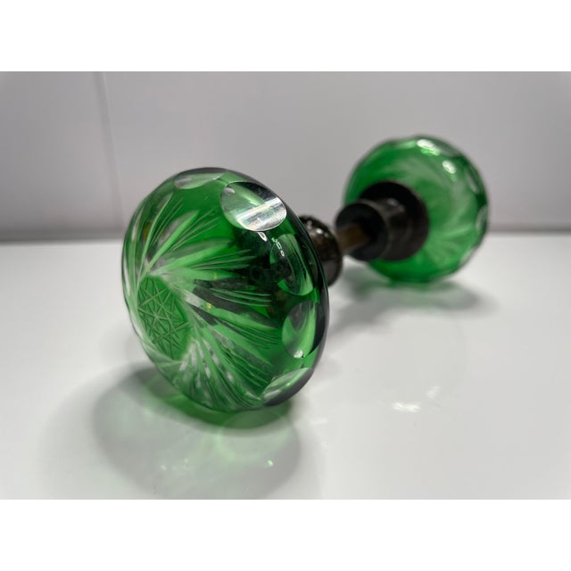 Here we have a beautiful set of antique/vintage bohemian Czech green cut glass swirl starburst door knobs with original...