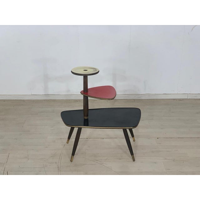 A beautiful vintage side table is for sale. For sale is a very nice vintage side table. • German design • 60s original •...