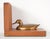 These vintage bookends feature two solid brass ducks mounted on oak wood bases. The ducks are not glued, and one spins....
