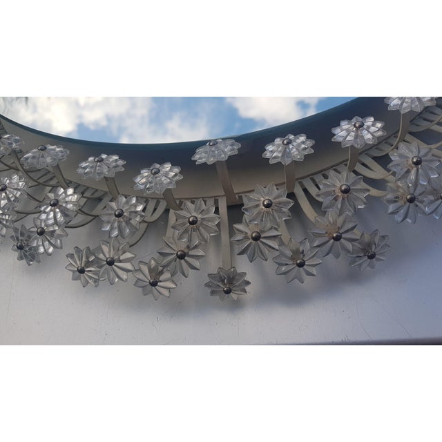 Beautiful, rare, round, backlit, large Mid-Century Modern mirror by Schöninger. A stunning, artistic design with numerous...