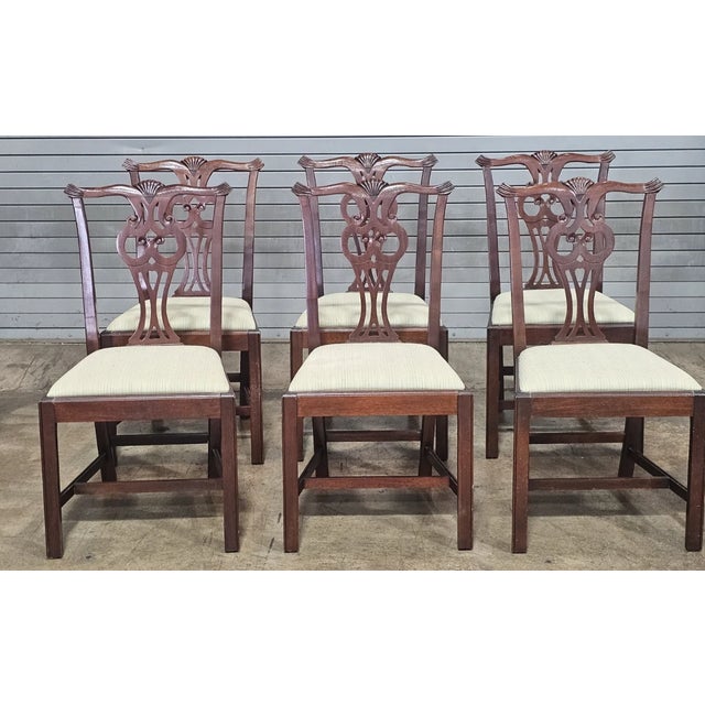 Store Item: Set of 6 Hickory Chair Chippendale Mahogany Dining Chairs Description: The set features 6 Hickory Chair Dining...